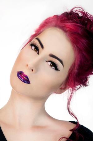 Still on of my favorite images! Bold lips created with Sleek Pout Paints and Clear gloss :)