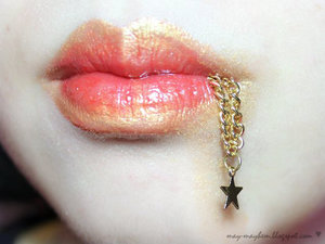 Inspired by the gorgeous colours and strength from flames. I did this using red and orange lipstick and gold pigment.