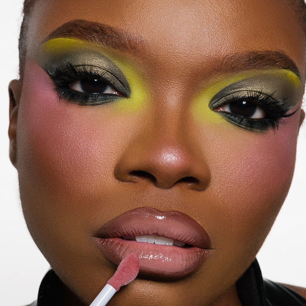 Model using Jeffree Star Cosmetics Supreme Gloss