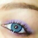 Basic black eyeliner and light purple eye shadow. (simple)