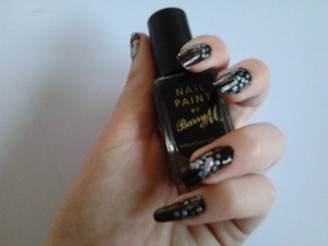 I saw a picture of lady gaga and I likes her nails in the pic so I tried to do them on my nails and thiis is how they turned out!

This is the link to the picture! > http://iamfabulicious.blogspot.co.uk/2012/01/meet-naomi-yasuda-nail-technician-to.html