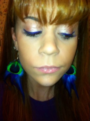 NYX Extreme purple eyeliner & earrings sent to me by Addie LaDawn