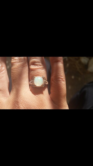 my new beautiful opal and diamond LeVian ring it's so stunning 
