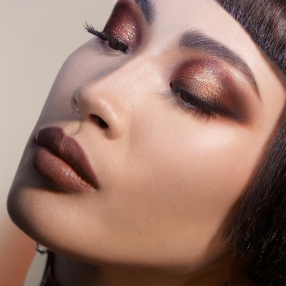 Natasha Denona model wearing the I Need a Warm Eyeshadow Palette