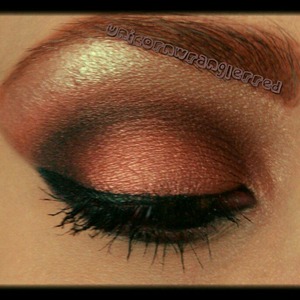 copper lid with Smokey brown contoured crease with winged liner
