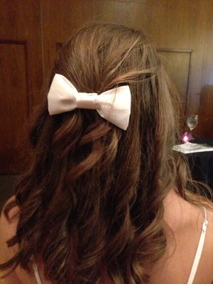 Curled my hair then added a bow! I actually made the bow:) 