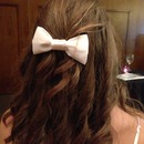 Curled hair and bow:)