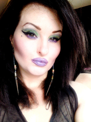 green and purple eyeshadow looks on pale skin  topped of with a bold cat eye   SEE THIS LOOK ON  MY YOUTUBE http://youtu.be/5fav3Sw9yGc