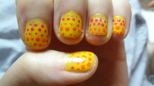 Yellow base with fake gradient polka dots (pink to orange).