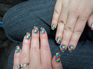 My friend wanted spring colored nails so this is what we decided on. 
Note: I did not do her acrylics. I only did the between-salon-visits-nail-art