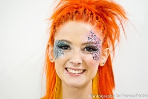 We had a fashion show at the beauty school I'm in, and this is what we came up with for hair and makeup.