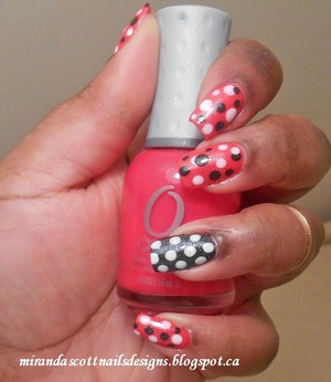 This manicure I created a Polka Dot manicure using Orly Passion fruit which is a matte pink polish. Wet n Wild French White Crème, Sally Hansen Black Out and Essie Pure Pearlfection for a slight shimmer .  
