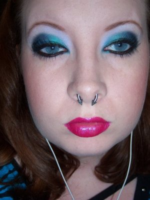 one of my favorite looks. Dark shimmery blue and bright fuchsia lips