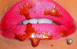 The Second MAC Lipstick I used was Toxic Tale from their Venomous Villanis Line.
http://smokincolour.blogspot.com/2012/09/lip-art.html