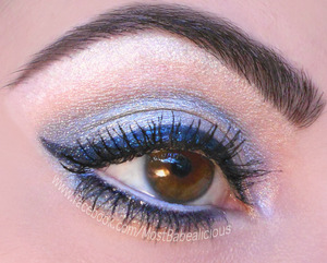 BFTE Cosmetics eyeshadows in Stonewashed (silver), and liner used in Casablanca Nights (glittery blue eyeshadow) applied with Makeup For Ever Eye Seal. Also used Verve & Bootycall by Urban Decay, Lancome Doll Lashes mascara, jordana white pencil liner.
www.facebook.com/mostbabealicious