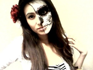 Here's a half skull face done with products from party city and some eyeshadow. 
