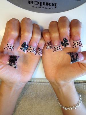 acrylic hand painted dots stenciled lace and 3D bows new jersey style and moon shaped nails.