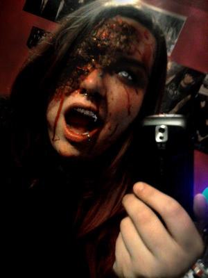 I used Cornflakes, toilet paper, liquid latex, black spray on hair dye, fake blood and white out contacts. 
