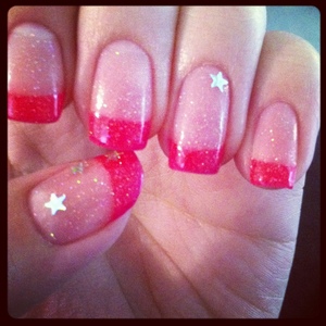 Super girly.  Pink tips Illamasqua in Collide, with China Glaze in Fairy Dust and little stars from a hot topic nail polish.  
