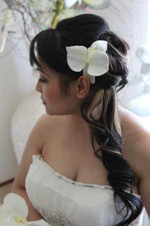 I love how everything on this bride is so pure.  Subtle make up and curls give the dress more of the attention.