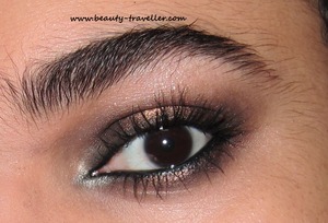 This is a classic dark bronze smokey eye with addition of MAC Rose Gold pigment for smoldering effect.