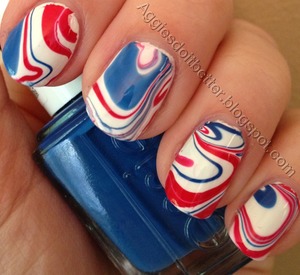 Red white and blue water marbled nails 