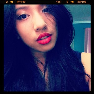 Fluffy hair, winged liner and matte red lips! :)