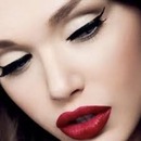 Winged look with red lipstick