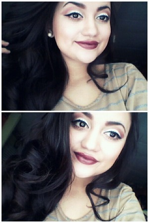 Lipstick is called Raisin Rapture by Loreal (: 
