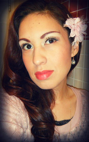 I am wearing a light coral Loreal lipstick then the Revlon lip butter in Peach Parfait on top, Found that this particular shade looks better on me on top of a pink or peach color.