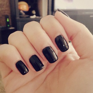 Wet N' Wild black polish with NYC shiny top coat on my natural nails.