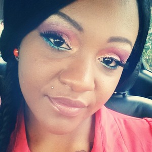 bright colors of blues pinks Oranges and plum toped off with glitter