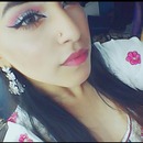 pink eyeshadow look with a cat eye.