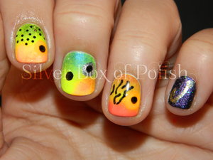 Eye-catching nail art inspired by the bright colors and patterns of fishing lures.