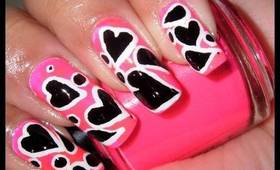 Hot Pink with Black and White Hearts nail design!