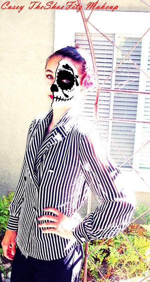 my friend Becca in the photo shoot with half painted sugar skull makeup