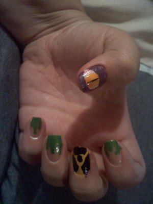 Part of my Halloween nails. These are a copy from another cute nail design I saw some where. Radioactive Monster! Too cute!