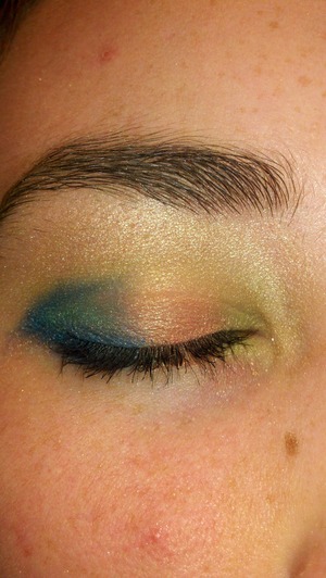 a playful eye, used a drugstore compact, not good quality eye shadow, colors are a little dull, just for fun though