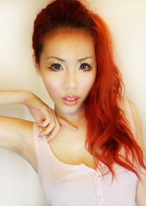 Some cheery brights and loads of eyeliner!
How-To link here:
http://www.valerie-ng.com/2011/11/tangy-tangerine.html
