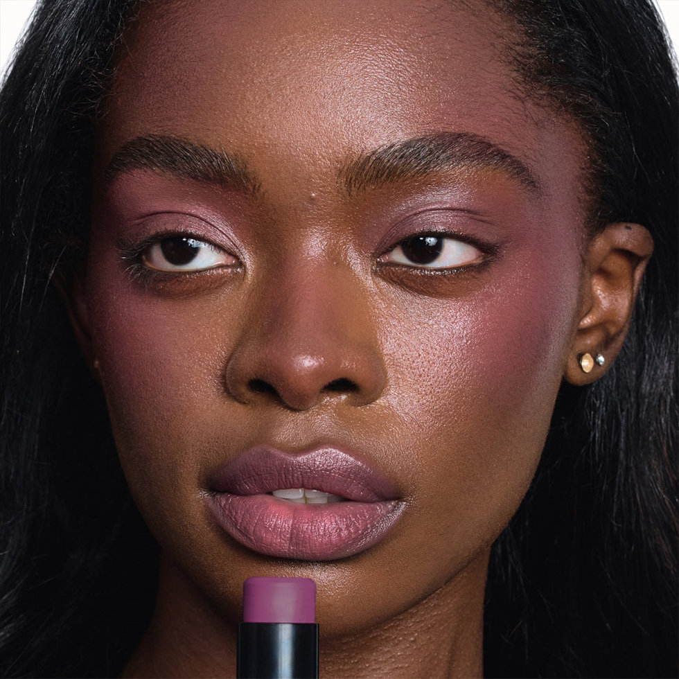 Nudestix model wearing the Nudies Blush Stick in Moodie Blu
