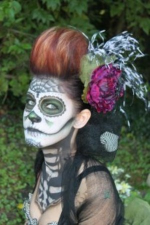 Day of the Dead makeup and hair I did for a competition while in beauty school. Won 1st place!
