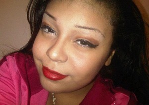 Classic liner, brown cut crease, champagne lid, classic red lip