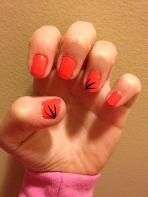 Today I have a design that will sure add a pop of color this summer season, and it will definitely catch the eyes of many.  If you want to learn how to re-create this beautiful nail design then gather up two of your favorite polishes and lets get started.  
1. Start off with a base coat to protect your natural nail.
2. Then paint your nails with a coral polish.
3. Next using a black striper on the outer left corner of your nails flick the brush three times to create this feather-like look.
4. And that's it! I really hope you give this design a try and if you do I would love to see it by using the hashtag #bellasnails on Beautylish, Instagram, and Twitter.
5. Have an amazing day and i'll see you soon!  