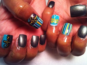 Egyptian themed nail art with a modern edge. 
