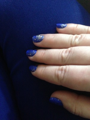 The blue polish and blue glitter are both Essie, the gold is from the icing "heart of gold"
