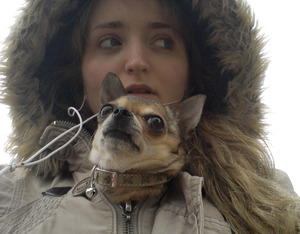 This is me and Tiash, a beautiful chihuahua bitch. 
She obeys me, and follows me wherever I go. She likes 
licking my corpse-like feet at night, even if they are really cold against her warm tongue. 
Woof woof!