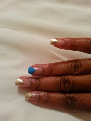 simple tape mani using Revlon Colorstay "Coastal Blue" and Revlon "Gold Coin" in a shape that reminds me of Moroccan textiles