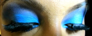 Inspired by a particularly vibrant cyan eyeliner, I created this look. 