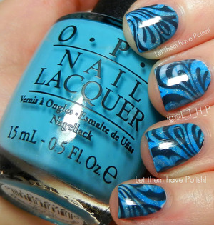 A sammiched look. For full details: http://www.letthemhavepolish.com/2013/02/muffin-mon-er-tuesday-opi-euro-marble.html