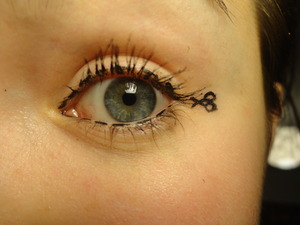 Using liquid eyeliner I created this 'cut along the dotted line' look inspired by Klaire De Lys